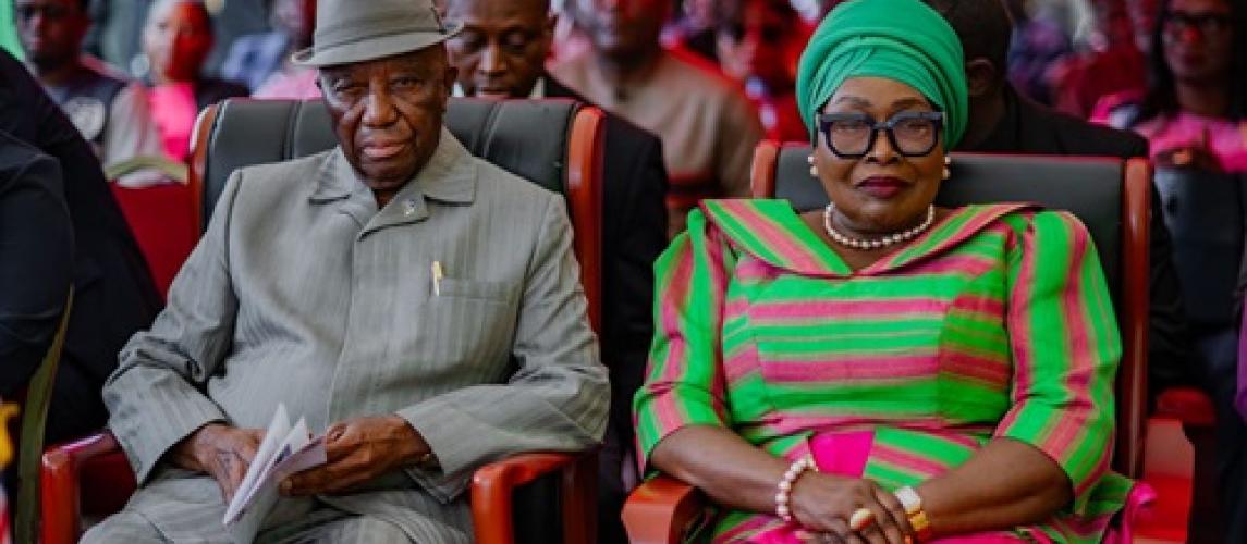 First Lady and President posed in a photograph