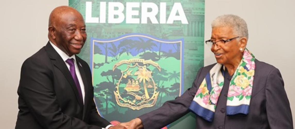 President Boakai and Former President Sirleaf posed in a photograph