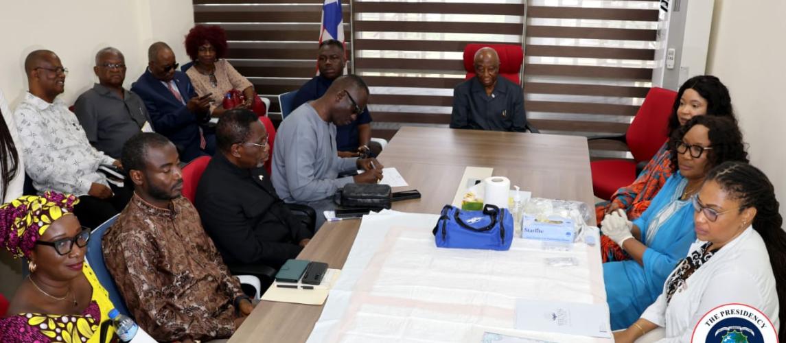 President Boakai posed in a photograph with cross section of Gov't officials and doctors after his drug test