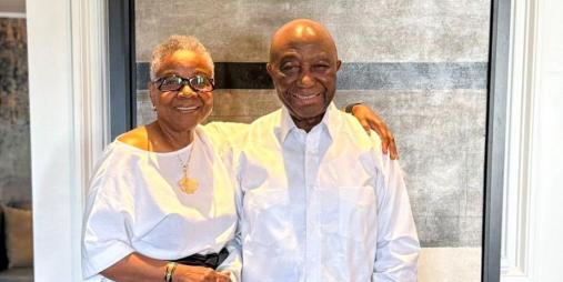 President Boakai poised in a photograph with the wife of the former Minister of State, Sylvester Grisby